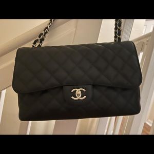 slightly used Chanel large double flap caviar quilted with dust bag.
